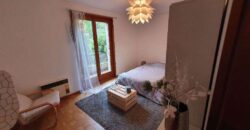 Charmant appartement de 3.5 pièces avec joli jardin et vue imprenable sur le lac